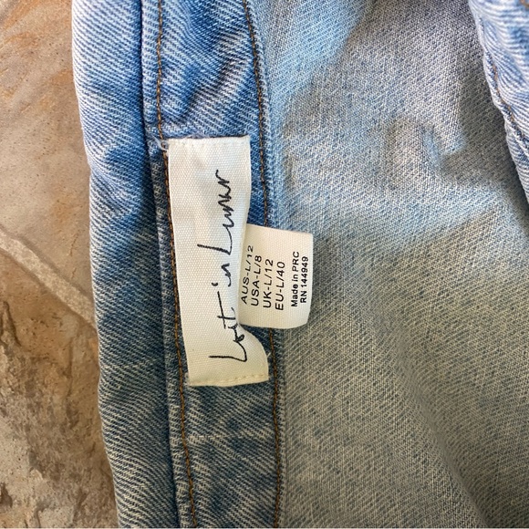 Women’s light wash denim shacket. - Picture 2 of 3